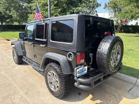 Used 2015 Jeep Wrangler Unlimited Rubicon w/ Dual Top Group AWD/4WD image 6