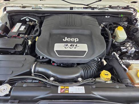 Used 2013 Jeep Wrangler Sport w/ Mopar Black Appearance Group image 18