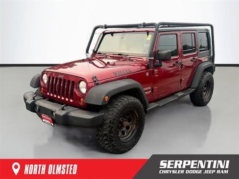 Used 2012 Jeep Wrangler Unlimited Sport AWD/4WD image 1