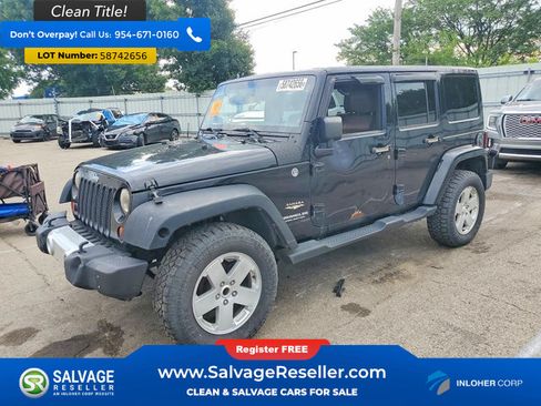 Used 2012 Jeep Wrangler Unlimited Sahara w/ Dual Top Group AWD/4WD image 1