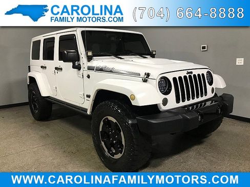 Used 2014 Jeep Wrangler Unlimited Sahara image 1