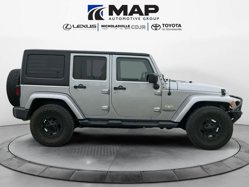 Used 2015 Jeep Wrangler Unlimited Sahara w/ Dual Top Group AWD/4WD image 6