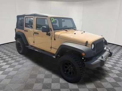 Used 2013 Jeep Wrangler Unlimited Sport w/ Mopar Black Appearance Group