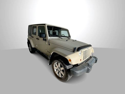 Used 2011 Jeep Wrangler Unlimited Sahara w/ Dual Top Group AWD/4WD image 2