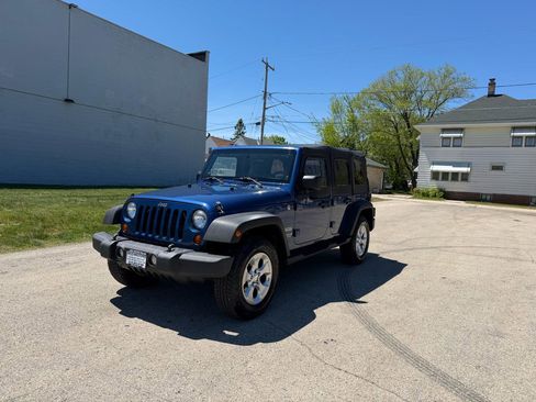 Used 2010 Jeep Wrangler Unlimited Sport AWD/4WD image 3