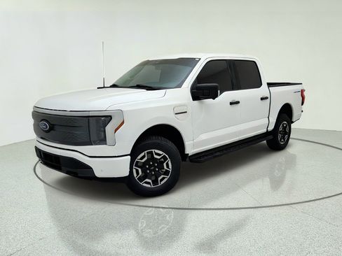 Used 2023 Ford F150 Lightning XLT AWD/4WD image 1