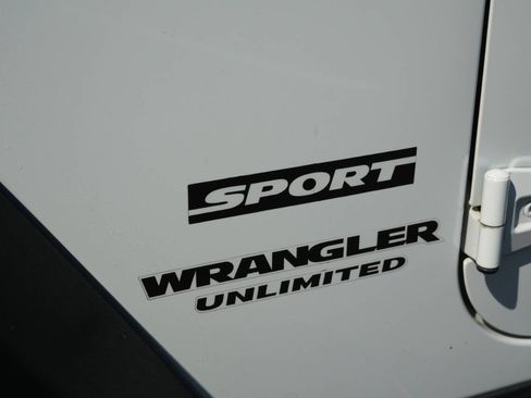 Used 2014 Jeep Wrangler Unlimited Sport w/ Mopar Black Appearance Group image 10