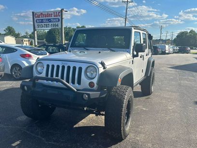 Used 2011 Jeep Wrangler Unlimited Rubicon w/ Dual Top Group