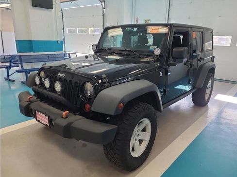 Used 2012 Jeep Wrangler Unlimited Sport AWD/4WD image 1
