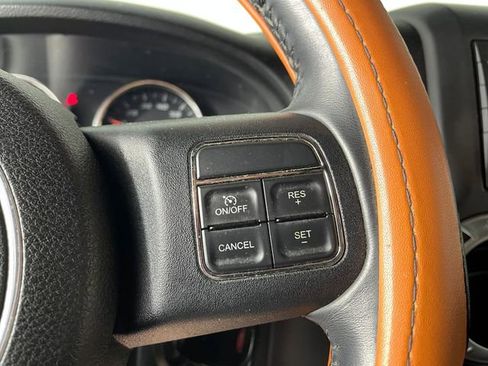 Used 2014 Jeep Wrangler Unlimited Sahara w/ Dual Top Group AWD/4WD image 8