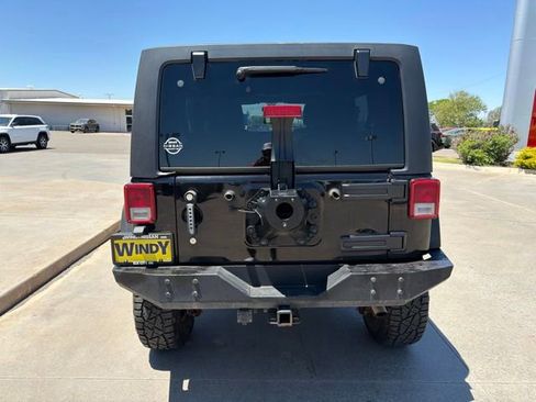 Used 2012 Jeep Wrangler Unlimited Rubicon w/ Dual Top Group AWD/4WD image 6