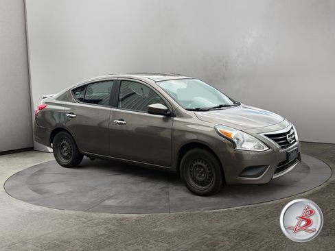 Used 2015 Nissan Versa SV image 1