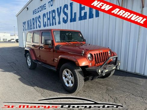 Used 2014 Jeep Wrangler Unlimited Sahara w/ Dual Top Group image 1