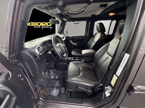 Used 2014 Jeep Wrangler Unlimited Sahara w/ Dual Top Group image 9