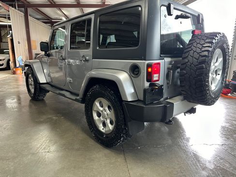 Used 2013 Jeep Wrangler Unlimited Sahara w/ Trailer Tow Group AWD/4WD image 3