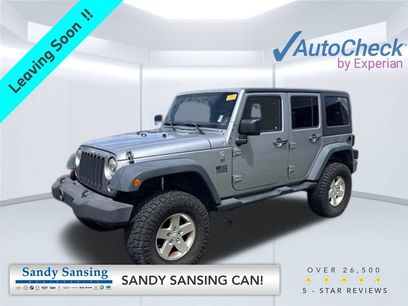 Used 2013 Jeep Wrangler Unlimited Sport