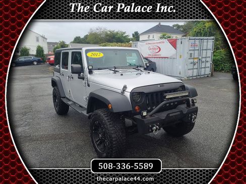 Used 2012 Jeep Wrangler Unlimited Sport w/ Dual Top Group AWD/4WD image 1