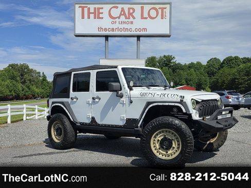 Used 2013 Jeep Wrangler Unlimited Sport AWD/4WD image 1