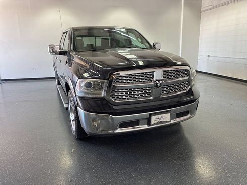 Used 2016 RAM 1500 Laramie AWD/4WD image 1