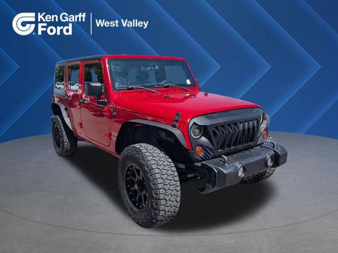 Used 2012 Jeep Wrangler Unlimited Sport w/ Trailer Tow Group AWD/4WD image 1