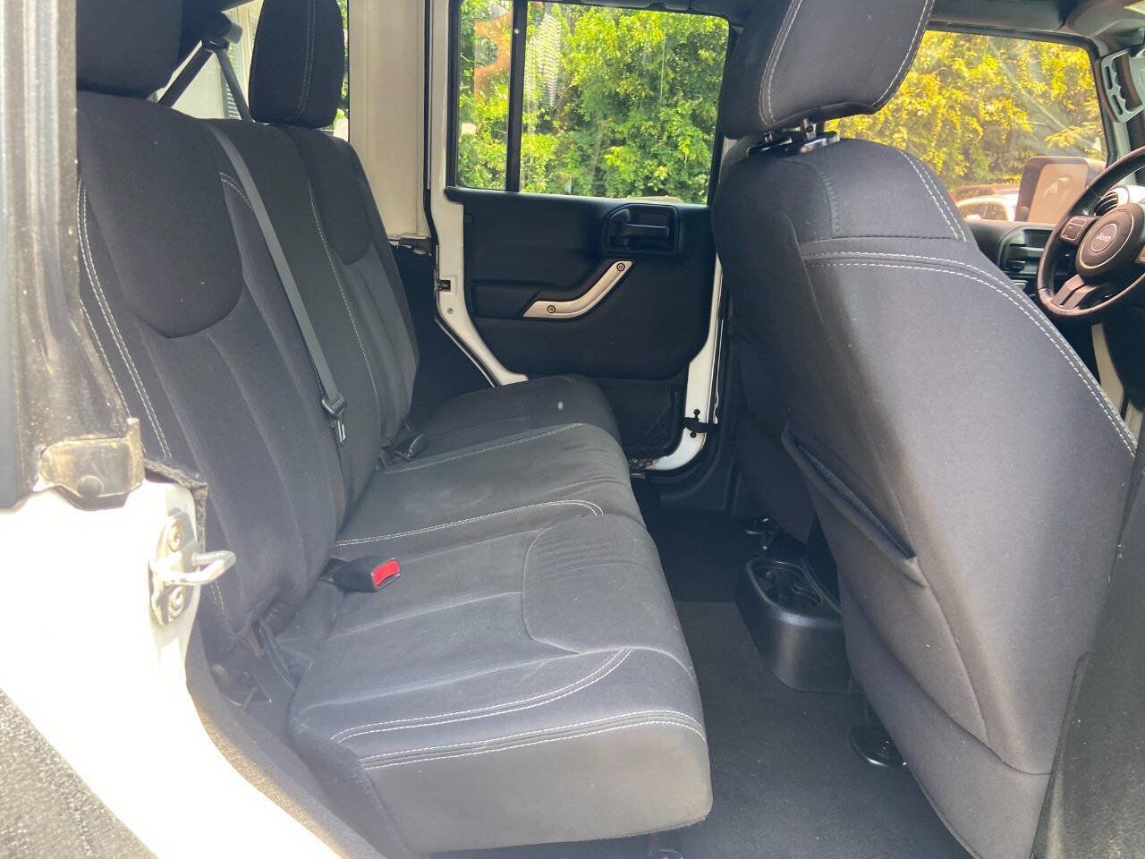 Used 2013 Jeep Wrangler Unlimited Sahara AWD/4WD image 16