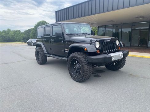 Used 2013 Jeep Wrangler Unlimited Sahara w/ Connectivity Group AWD/4WD image 1