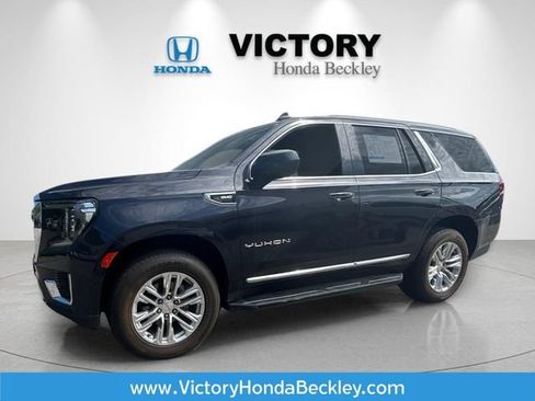 Used 2023 GMC Yukon SLT AWD/4WD image 1