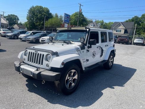 Used 2017 Jeep Wrangler Unlimited Sahara w/ Dual Top Group AWD/4WD image 2