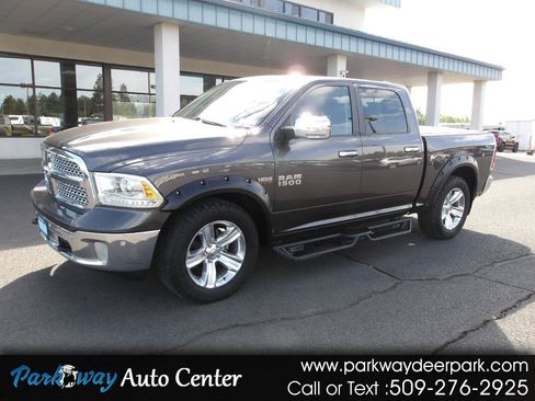 Used 2014 RAM 1500 Laramie w/ Convenience Group AWD/4WD image 1