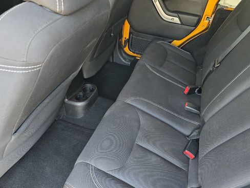 Used 2014 Jeep Wrangler Unlimited Rubicon w/ Dual Top Group AWD/4WD image 12