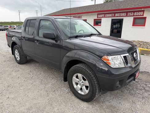 Used 2012 Nissan Frontier SV w/ SV Premium Utility Pkg AWD/4WD image 1