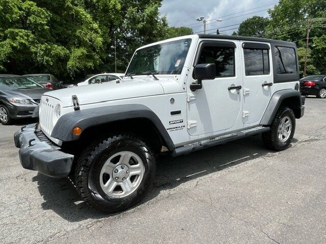 Used 2017 Jeep Wrangler Unlimited Sport w/ Mopar Black Appearance Group AWD/4WD image 1