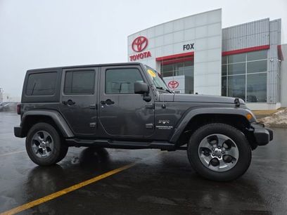 Used 2016 Jeep Wrangler Unlimited Sahara w/ Dual Top Group