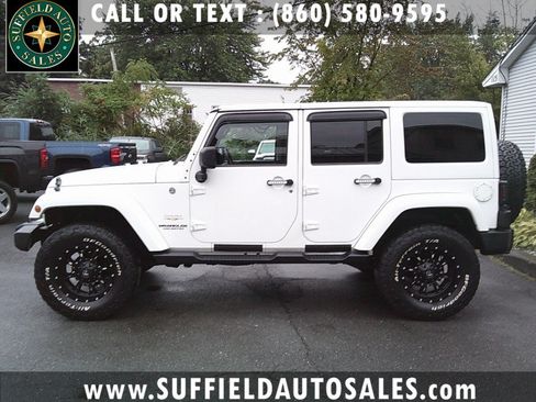 Used 2012 Jeep Wrangler Unlimited Sahara w/ Dual Top Group AWD/4WD image 1