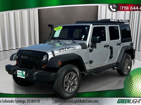 Used 2012 Jeep Wrangler Unlimited Rubicon w/ Dual Top Group image 1