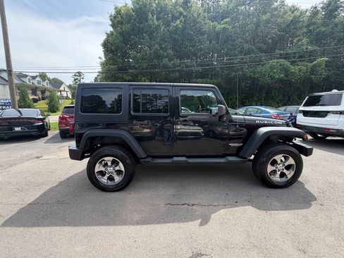 Used 2012 Jeep Wrangler Unlimited Rubicon w/ Dual Top Group AWD/4WD image 4