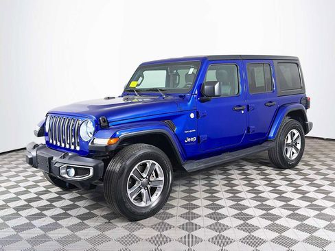 Used 2018 Jeep Wrangler Unlimited Sahara w/ Dual Top Group AWD/4WD image 1