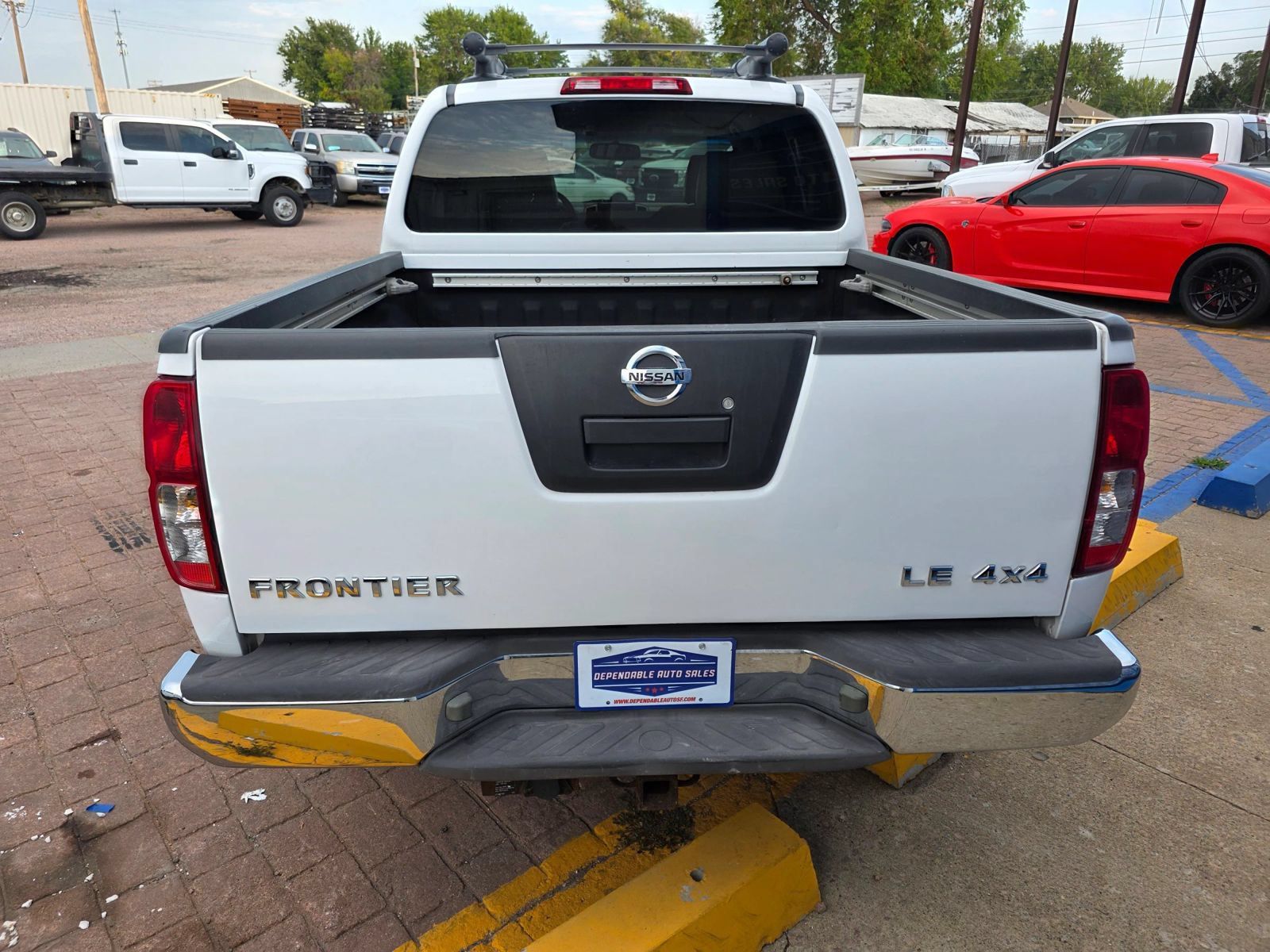Used 2009 Nissan Frontier LE w/ LE Value Truck Pkg AWD/4WD image 6