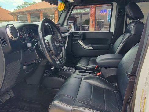 Used 2012 Jeep Wrangler Unlimited Sahara w/ Dual Top Group AWD/4WD image 13