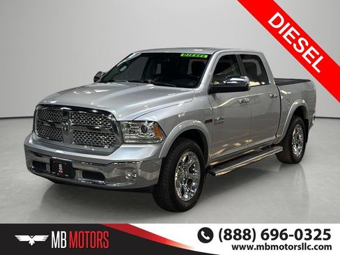 Used 2017 RAM 1500 Laramie AWD/4WD image 1