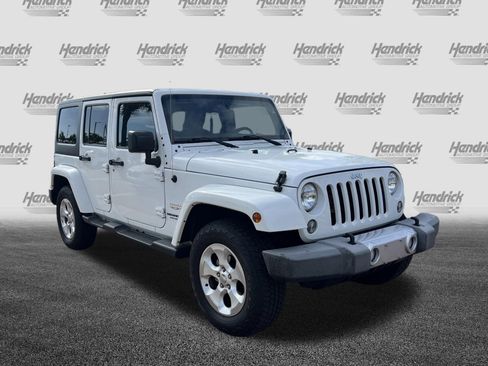 Used 2015 Jeep Wrangler Unlimited Sahara w/ Dual Top Group image 2