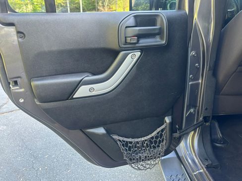 Used 2014 Jeep Wrangler Unlimited Sahara w/ Dual Top Group AWD/4WD image 15