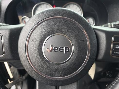 Used 2014 Jeep Wrangler Unlimited Sahara AWD/4WD image 12