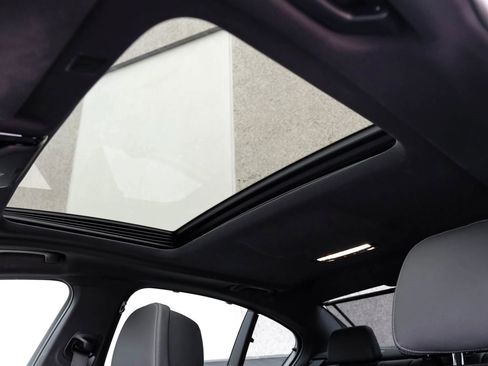 Used 2023 BMW M550i xDrive w/ Executive Package AWD/4WD image 4