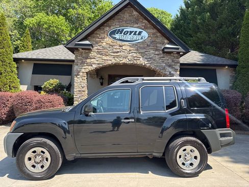 Used 2011 Nissan Xterra X AWD/4WD image 1