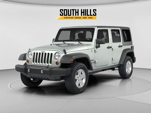 Used 2014 Jeep Wrangler Unlimited Sahara w/ Dual Top Group image 1