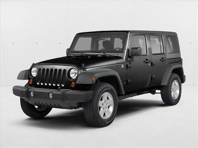 Used 2013 Jeep Wrangler Unlimited Sahara w/ Dual Top Group