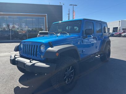 Used 2016 Jeep Wrangler Unlimited Sport w/ Mopar Black Appearance Group