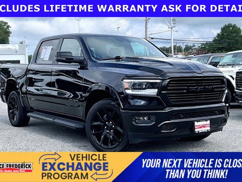 Used 2024 RAM 1500 Laramie AWD/4WD image 1