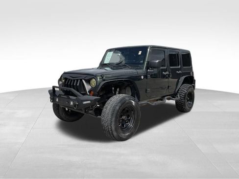 Used 2012 Jeep Wrangler Unlimited Sport AWD/4WD image 1